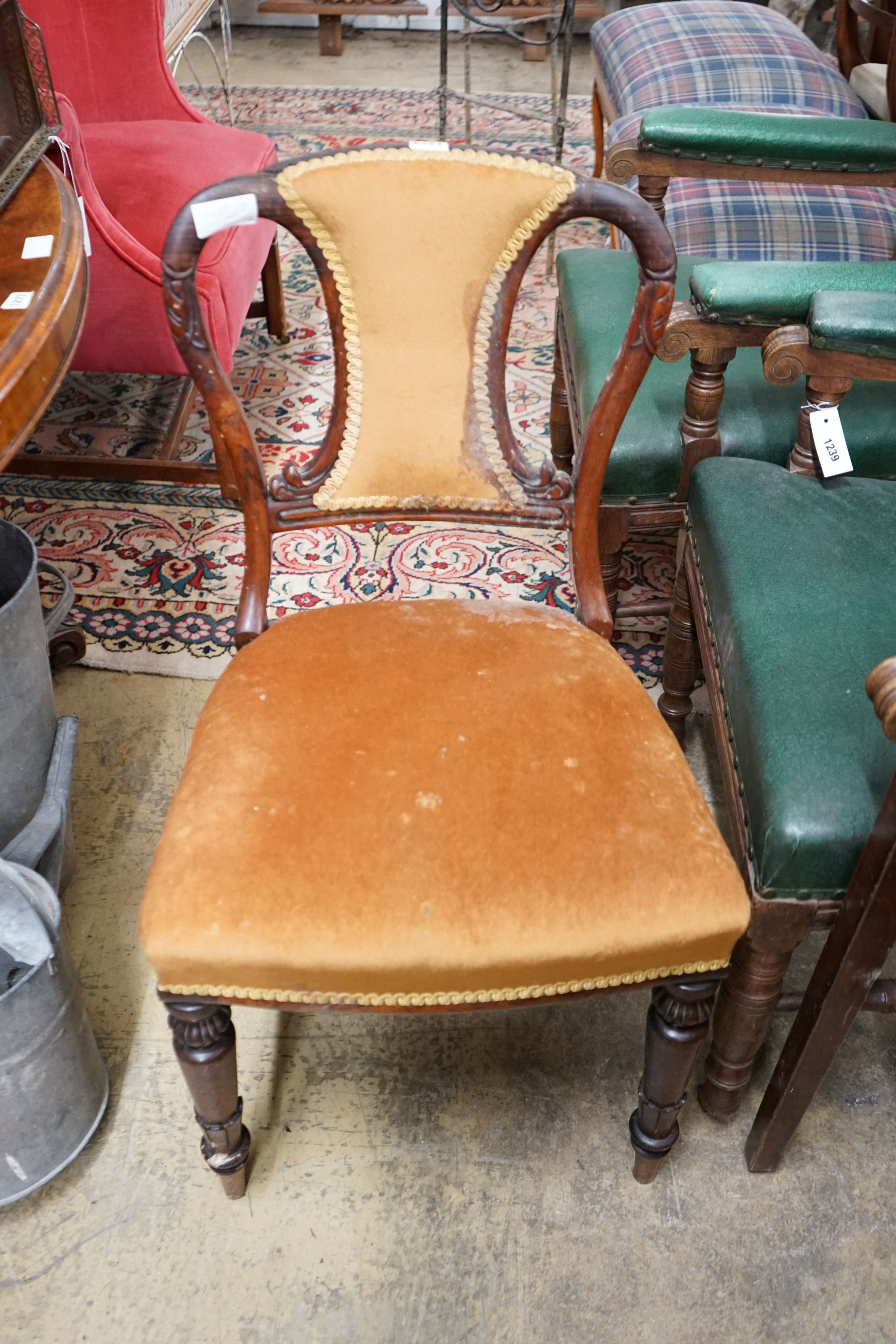 A set of five Victorian rosewood dining chairs